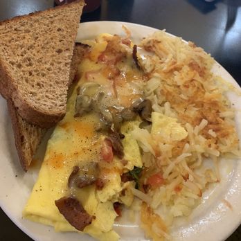 The Breakfast Club and Pub - Florentine Omelet so much food - American Near Me - La Crosse, Wisconsin