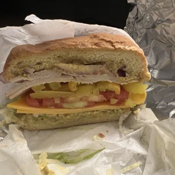 51st Deli West End - Simple turkey sandwich on a brioche bun with brown mustard, lettuce, onions, tomato, banana peppers and cheddar cheese. - Sandwiches Near Me - Nashville, Tennessee 51st Deli West End - Simple turkey sandwich on a brioche bun with brown mustard, lettuce, onions, tomato, banana peppers and cheddar cheese. - Sandwiches Near Me - Nashville, Tennessee