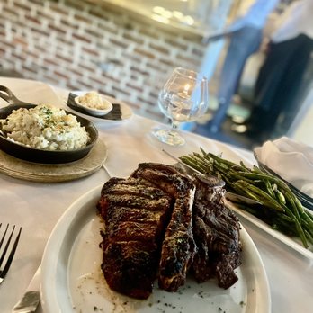 Cotton Calf Kitchen - Porterhouse with mushroom risotto & prosciutto green beans - New American Near Me - Braselton, Georgia