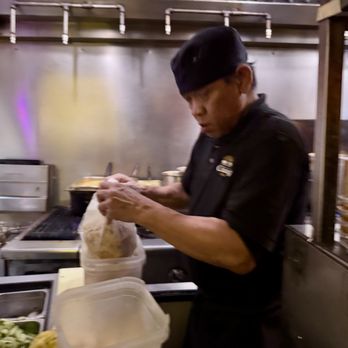 The Thonglor - One of the cooking staff working hard - Thai Near Me - San Francisco, California The Thonglor - One of the cooking staff working hard - Thai Near Me - San Francisco, California