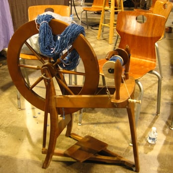Maker Faire: NC - Spinning wheel at the String Thing booth - Festivals Near Me - Raleigh, North Carolina