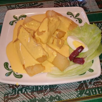 Rinconcito Peruano - Fried Yucca with cheese sauce on top the perfect alternative to french fries - Latin American Near Me - Wharton, New Jersey Rinconcito Peruano - Fried Yucca with cheese sauce on top the perfect alternative to french fries - Latin American Near Me - Wharton, New Jersey