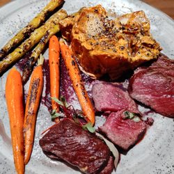 Hunter's Club - My half eaten elk and excellent potatoes that were presented in an unexpected wonderful way