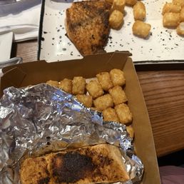 Salmon with tots my cold dine in, and the recook that came an hour and a half after we sat down. Salmon with tots my cold dine in, and the recook that came an hour and a half after we sat down.