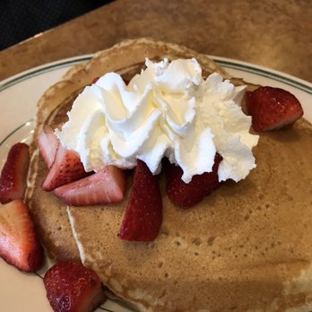 Village Square Cafe - Stack of buttermilk pancakes - Breakfast & Brunch Near Me - Redmond, Washington Village Square Cafe - Stack of buttermilk pancakes - Breakfast & Brunch Near Me - Redmond, Washington