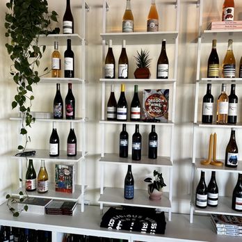 Division Winemaking - a variety of wines on shelves - Wine Tasting Room Near Me - Portland, Oregon Division Winemaking - a variety of wines on shelves - Wine Tasting Room Near Me - Portland, Oregon