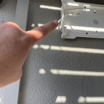 Digital Installers - Old, substandard cabling shown next to Araknis Outdoor Access Point bracket. - Home Theatre Installation Near Me - Long Beach, California