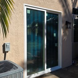 Brosway Construction - New installed sliding door. Stucco repair
