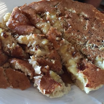 Burg'r Bar - Yummy banana pancakes someone couldn't wait to dig into before I snapped this photo - Burgers Near Me - Punta Gorda, Florida