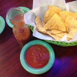 El Charro - Chips are the thicker variety (cold & bland)  Salsa is very mild (tomatoes, pepper, maybe cilantro? Maybe cumin?)