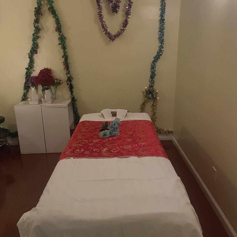 Massage Table with poles above should you need more pressure aka Ashiatsu style of massage.