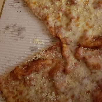 Uncle Tony's - The thin, crispy crust, cheese only, extra cheese. Note the lack of heavy grease spots. - Italian Near Me - Valley Glen, California Uncle Tony's - The thin, crispy crust, cheese only, extra cheese. Note the lack of heavy grease spots. - Italian Near Me - Valley Glen, California
