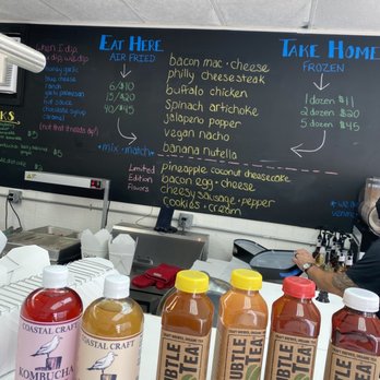 All American Wontons - Flavor and pricing board, and a selection of Subtle Tea and Coastal Craft Kombucha to drink. - Specialty Food Near Me - Melville, New York All American Wontons - Flavor and pricing board, and a selection of Subtle Tea and Coastal Craft Kombucha to drink. - Specialty Food Near Me - Melville, New York