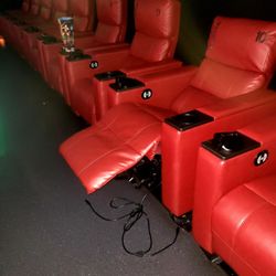 Cinemark Movies 14 - Row E damaged and broken D-Box seat in auditorium 2.