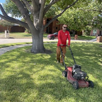 K1 Lawn Care - a man mowing the lawn - Lawn Services Near Me K1 Lawn Care - a man mowing the lawn - Lawn Services Near Me