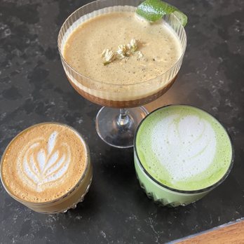 Rowan Coffee - Cappuccino on the left, matcha latte on the right, one of the special coffee 'cocktails' in the back (not alcoholic). - Coffee & Tea Near Me - Asheville, North Carolina Rowan Coffee - Cappuccino on the left, matcha latte on the right, one of the special coffee 'cocktails' in the back (not alcoholic). - Coffee & Tea Near Me - Asheville, North Carolina