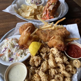Sam's Chowder House - Mixed seafood platter: 1 crab cake, 2 shrimp, 1 polluck fish, and calamari - Seafood Near Me - Half Moon Bay, California Sam's Chowder House - Mixed seafood platter: 1 crab cake, 2 shrimp, 1 polluck fish, and calamari - Seafood Near Me - Half Moon Bay, California