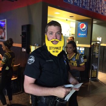 Buffalo Wild Wings - Officer showing team spirit - American Near Me - Lexington, Kentucky Buffalo Wild Wings - Officer showing team spirit - American Near Me - Lexington, Kentucky