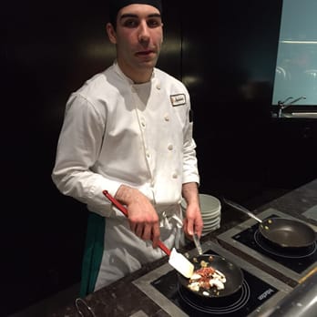 Azure Restaurant & Bar - Chef Jason works magic at the omelette station. - Canadian (New) Near Me - Toronto, Ontario
