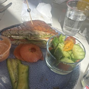 Utopia Caffe - Pesto Sandwich with a little side salad cup - Breakfast & Brunch Near Me - Tustin, California