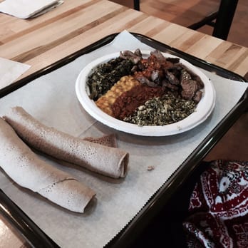 Nazrawi Ethiopian Restaurant  - Beef tibs plate.  You don't get all this anywhere else for under $13.00! - Ethiopian Near Me - Silver Spring, Maryland