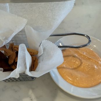 Zaatar Lebanese Grill - Complimentary appetizer spicy garlic sauce and pita chips. - Lebanese Near Me - San Antonio, Texas