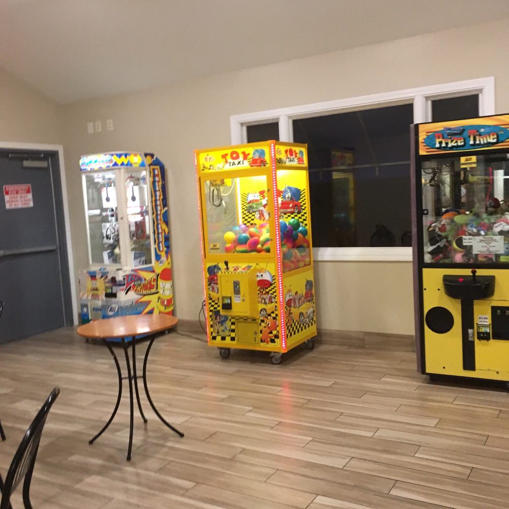 Cold Stone Creamery - a row of arcade machines - Ice Cream & Frozen Yogurt Near Me - Holbrook, Massachusetts