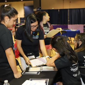 Visions Optometry - Dr. Heidi Pham-Murphy shows her team of volunteers how to perform depth perception and color vision testing!  #SpecialOlympicsOpeningEyes - Optometrists Near Me - Sacramento, California