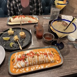 Puerto Vallarta - Burrito Vallarta (bottom) & Grande Fajita Burritos (top, drowned in queso for the cheese lovers)