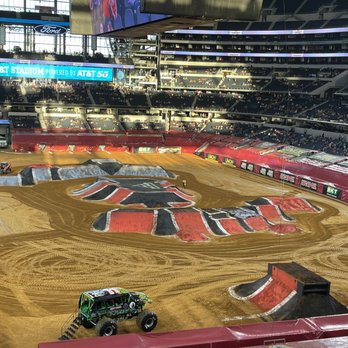 AT&T Stadium - Pre Monster Truck start: layout of the stadium and the monster truck show setup. Same stadium where the Dallas Cowboys play. - Stadiums & Arenas Near Me - Arlington, Texas AT&T Stadium - Pre Monster Truck start: layout of the stadium and the monster truck show setup. Same stadium where the Dallas Cowboys play. - Stadiums & Arenas Near Me - Arlington, Texas