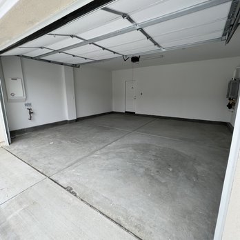 The Epoxy Garage Guy - Before - standard 2 car garage new construction - Flooring Near Me