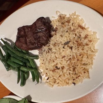 Black Angus Steakhouse - 6oz Filet Mignon Center Cut with green beans and rice pilaf - Steakhouses Near Me - El Cajon, California Black Angus Steakhouse - 6oz Filet Mignon Center Cut with green beans and rice pilaf - Steakhouses Near Me - El Cajon, California