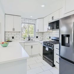 Stone Creations - Kitchen & Vanities Remodel Using a White Quartz