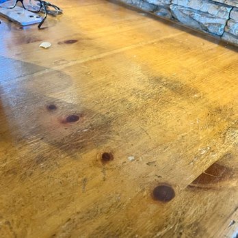 Raul & Theresa's - Dirty, greasy table with child's handprint visible in the grease - Mexican Near Me - Goodyear, Arizona