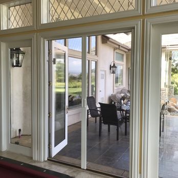 Mr. Window Screen - A set of Clearview retractable screen doors installed over a double set of French doors - Windows Installation Near Me Mr. Window Screen - A set of Clearview retractable screen doors installed over a double set of French doors - Windows Installation Near Me