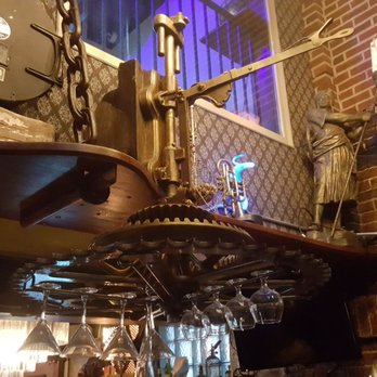 The Alchemist - Love the wine bottle rack! - Cocktail Bars Near Me - White Bear Lake, Minnesota