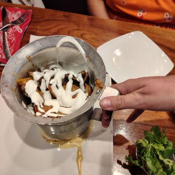 Guy Fieri’s Branson Kitchen & Bar - Pulled pork trash can nachos - Bars Near Me - Branson, Missouri Guy Fieri’s Branson Kitchen & Bar - Pulled pork trash can nachos - Bars Near Me - Branson, Missouri