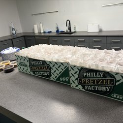 Philly Pretzel Factory - 125 Philly wrapped pretzels, cheese dip, brownie dip, cinnamon dip, and mustards
