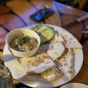 Cedars at Pier One - Hummus plate with pita bread and cucumbers (didn't try as it came after our meal) - Seafood Near Me - Kennewick, Washington Cedars at Pier One - Hummus plate with pita bread and cucumbers (didn't try as it came after our meal) - Seafood Near Me - Kennewick, Washington