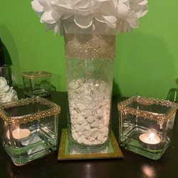 Dollar Tree - This see are center pieces I am using for my tables for the wedding reception. All came from the dollar tree! Except the big flower.
