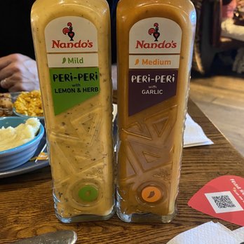 Nando's - Lemon & Herb and Garlic Peri Peri Sauces - Chicken Shop Near Me - London, XGL
