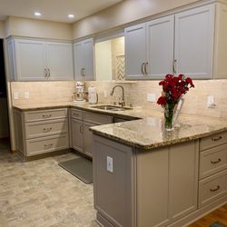 Savers Kitchen & Bath - Refaced, under counter lighting and Countertops and backsplash