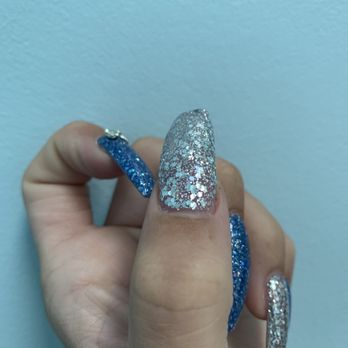 Bee Nails - Filed down nail acrylic nail at the Nail bed so you have to get a fill faster - Nail Salons Near Me - Penticton, British Columbia