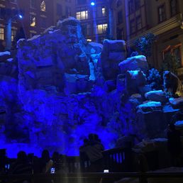 Indoor waterfall with fake snow and animatronic bear