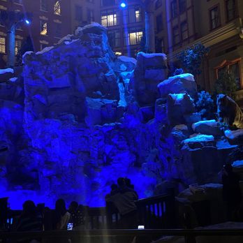 Mystic Falls Park - Indoor waterfall with fake snow and animatronic bear - Performing Arts Near Me - Las Vegas, Nevada