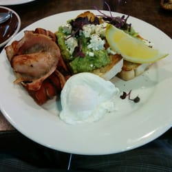 Hard Coffee Beach Cafe - Smashed avo with feta on sourdough with a side of bacon and a poached egg.