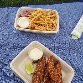 Pier 17 - Marinated Sesame Crusted chicken fingers with a cirtus emulsion ($15) and French Fries with herbs and garlic aioli ($10) - Venues & Event Spaces Near Me - New York, New York Pier 17 - Marinated Sesame Crusted chicken fingers with a cirtus emulsion ($15) and French Fries with herbs and garlic aioli ($10) - Venues & Event Spaces Near Me - New York, New York