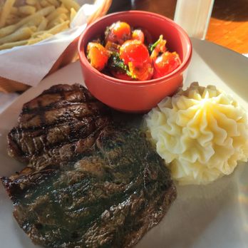 Nepenthe - Ribeye w mashed potatoes and a tomato side - New American Near Me - Big Sur, California