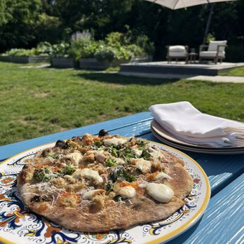 The Chanler at Cliff Walk - Spicy Roasted Chicken Pizza- available on the Wine Garden menu until September 1 - Hotels Near Me - Newport, Rhode Island