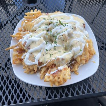 Washoe Public House - Irish Nachos w/ Three Cheese Sauce - New American Near Me - Reno, Nevada Washoe Public House - Irish Nachos w/ Three Cheese Sauce - New American Near Me - Reno, Nevada